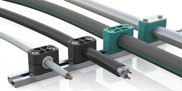 DIN clamps from Stauff can now be used for additional line types with optimum results: cables and corrugated conduit hoses