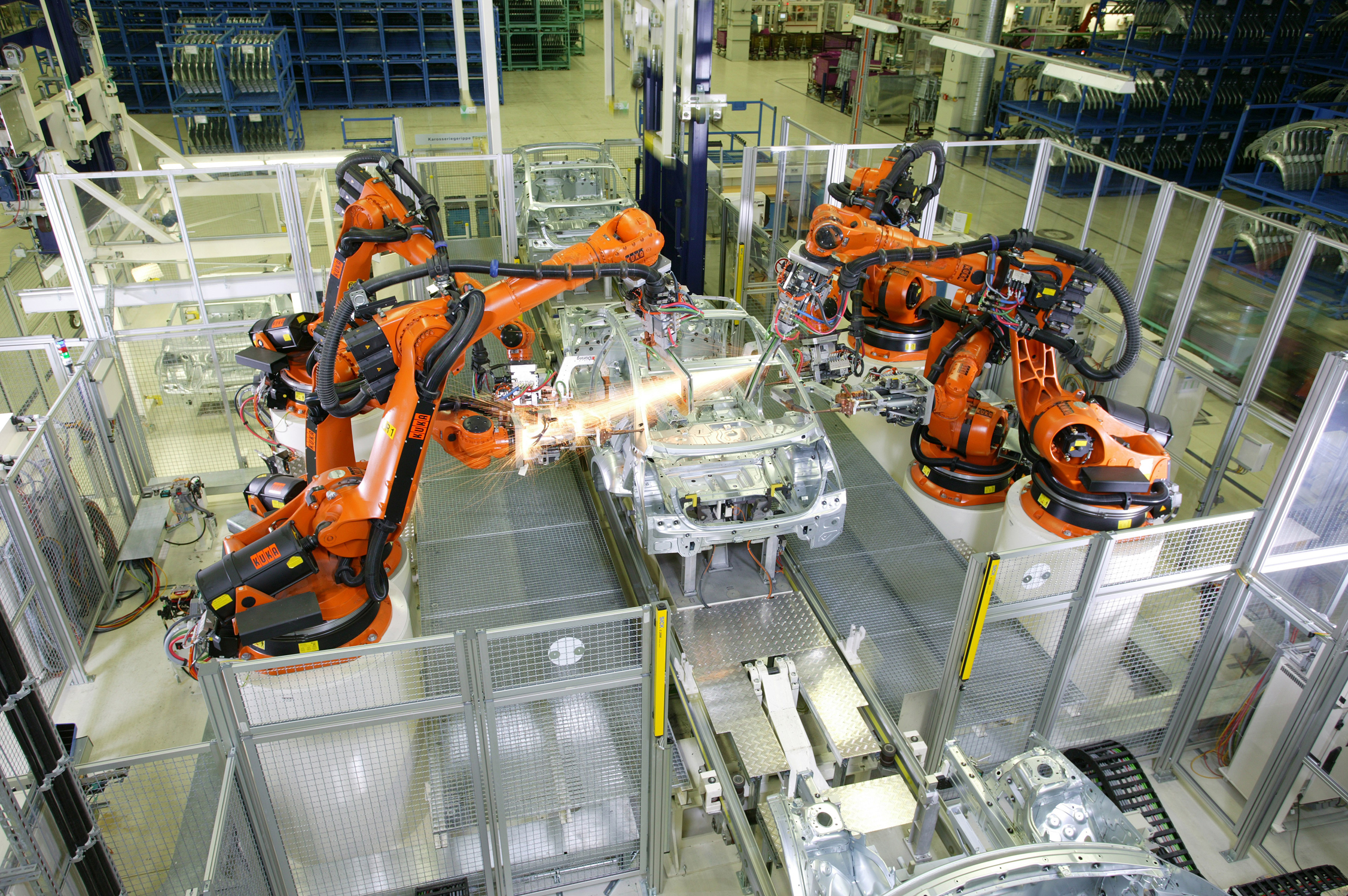 Сборка промышленных машин. Роботизированный Технологический комплекс kuka. Промышленные роботы. Роботы в промышленности. Сборочные промышленные роботы.
